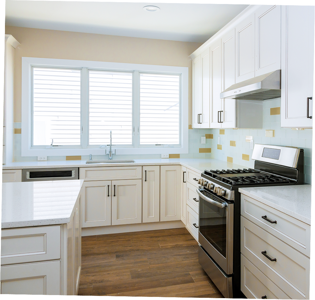 White kitchen with light wood floor, stainless steel appliances, and white cabinets.