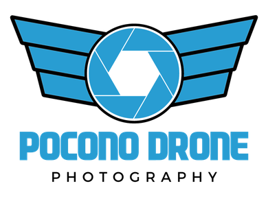 A logo for pocono drone photography with a camera lens and wings