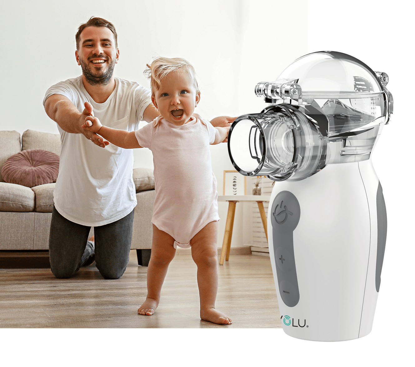 Nebulizer nano AIR PRO. A man is kneeling down next to a baby and an inhaler.