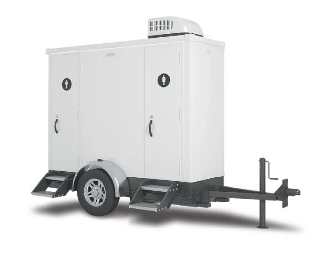 White mobile generator trailer with enclosed compartments and hitch on wheels