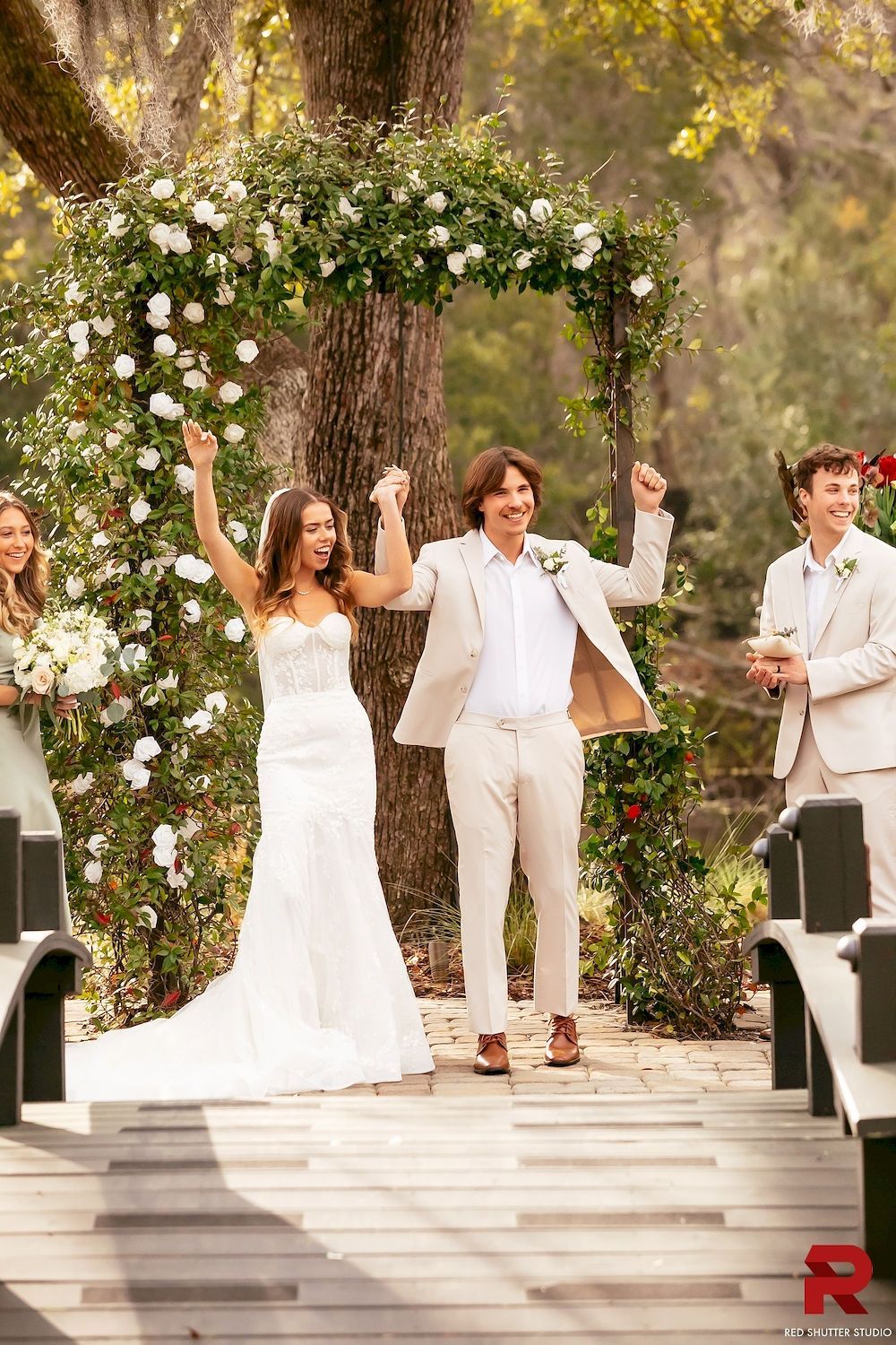 arch flowers with bride