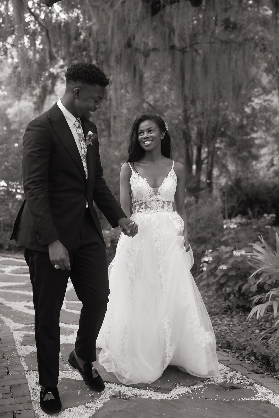 Black and white pic of bride and groom