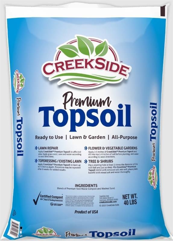 Creekside Premium Topsoil bag, blue-and-white packaging with leaves and planting icons