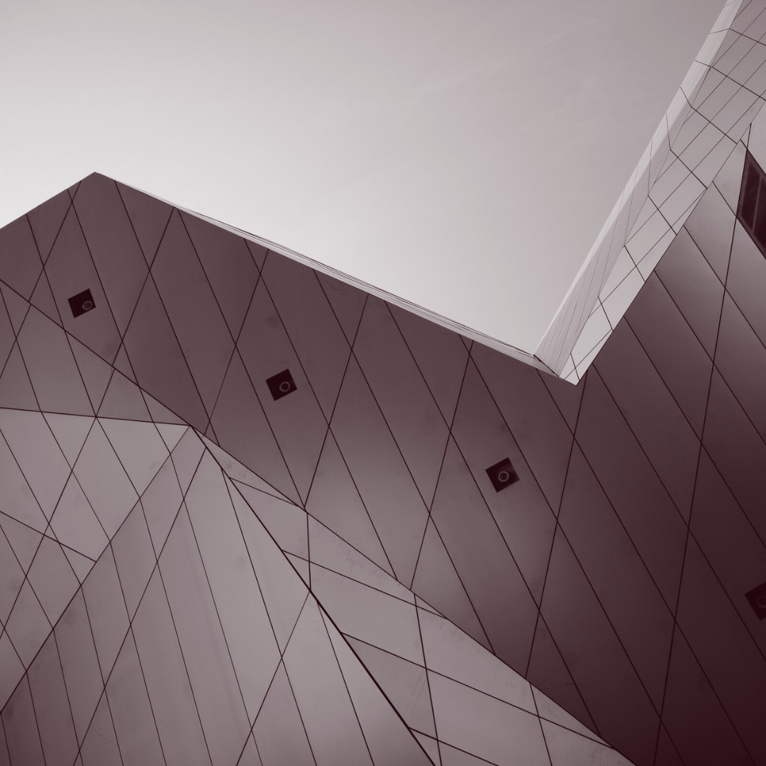 Looking up at the ceiling of a building with a geometric pattern
