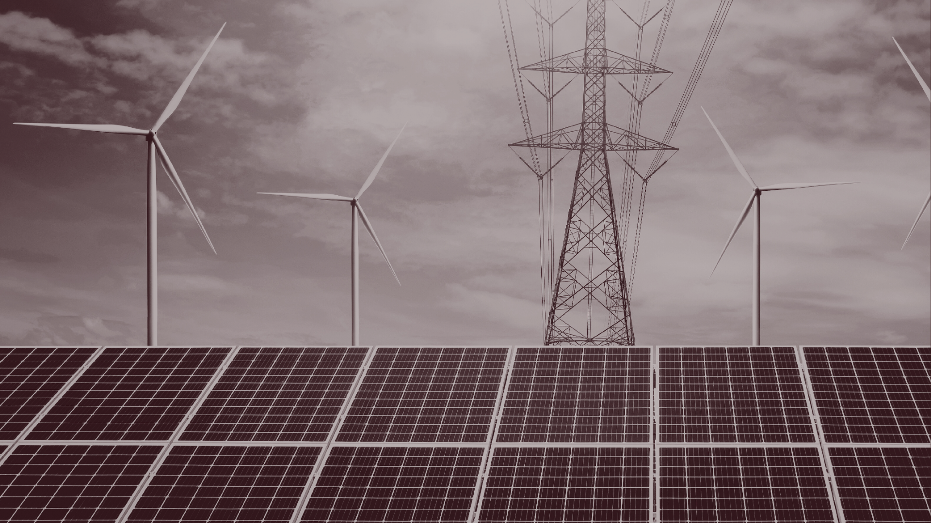 Solar panels with wind turbines and power lines under a cloudy sky, showing clean energy infrastructure.