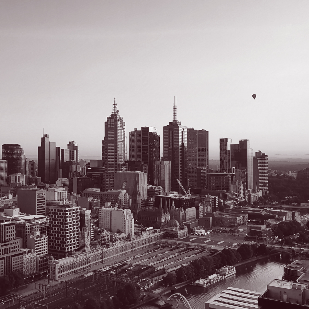 A black and white photo of a city skyline