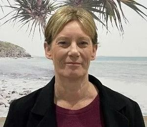 Person in a Black Blazer and Maroon Shirt — Dwyer Law Group in Surfers Paradise, QLD