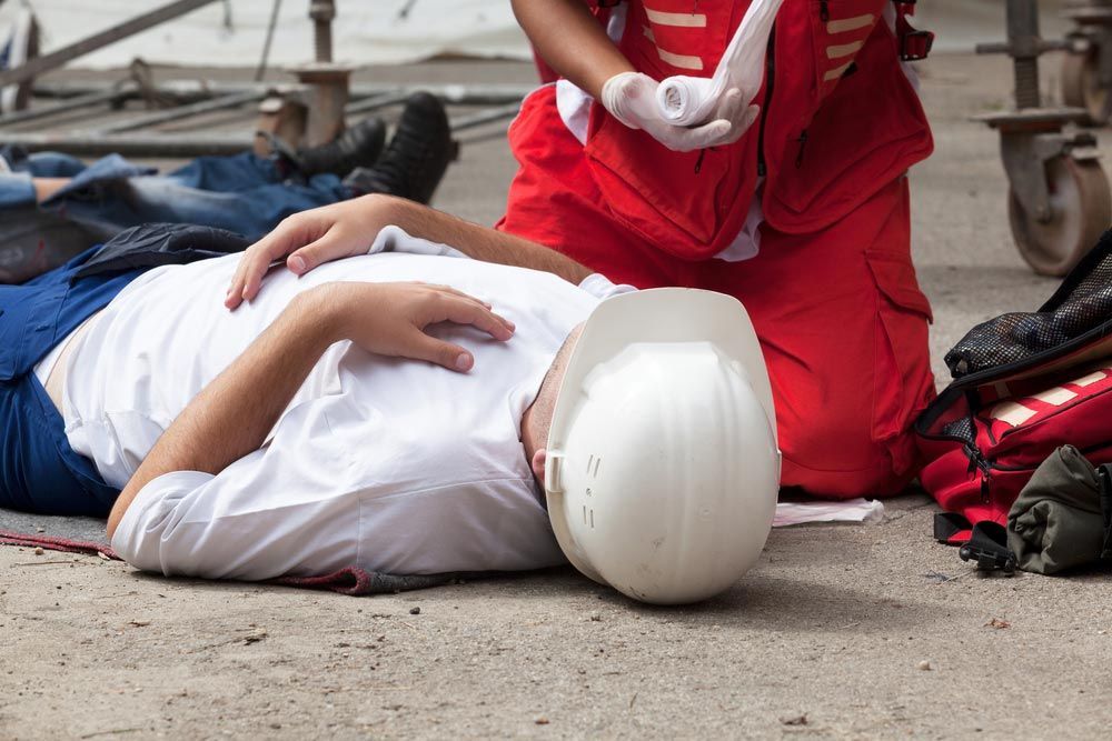 Man With White Helmet Laying Down After A Fall