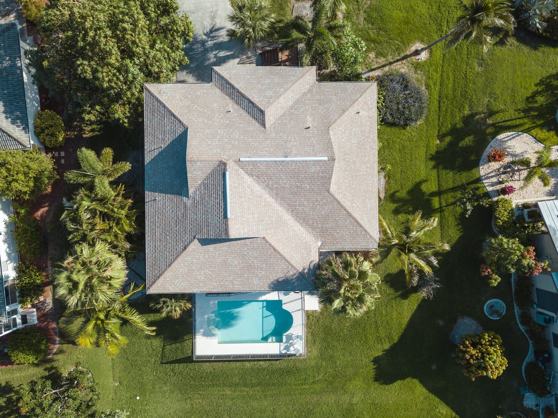 Homeowner reviewing a finished roofing project in Pembroke Pines