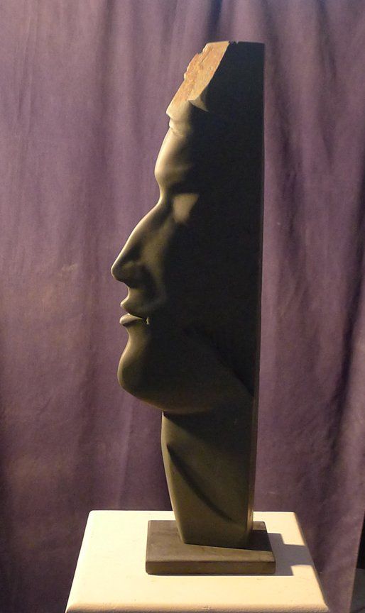 Stone carved face.