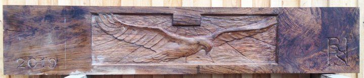 Waulnut wood carvign. Bird sculpture. Eagle.