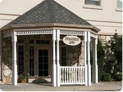 A building with a sign that says pediatrics on it