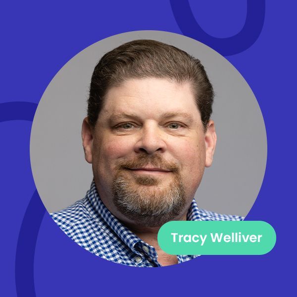 A man with a beard and a name tag that says Tracy Welliver.