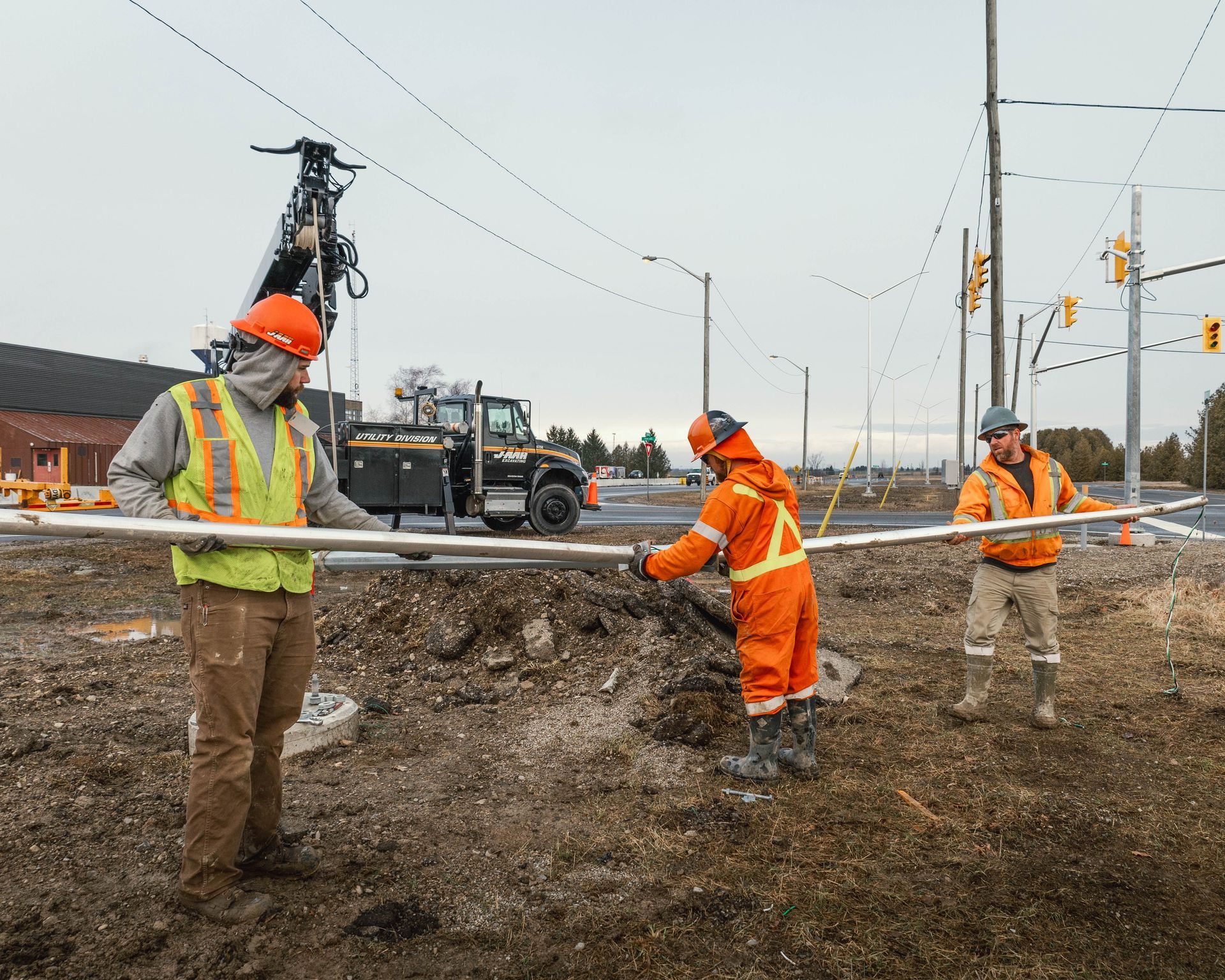 a group of construction workers are working on a construction site .