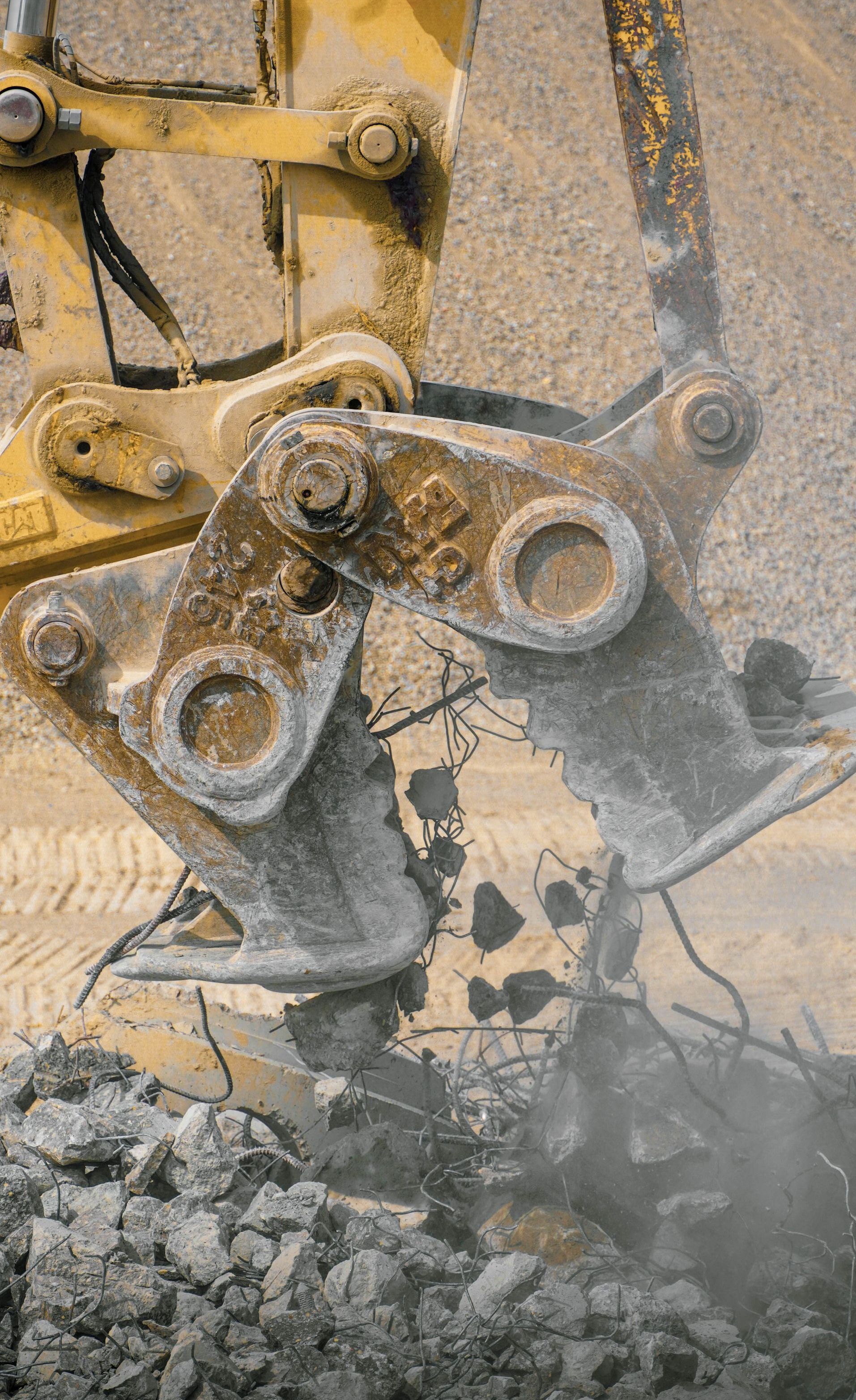 A bulldozer is digging a hole in the ground.