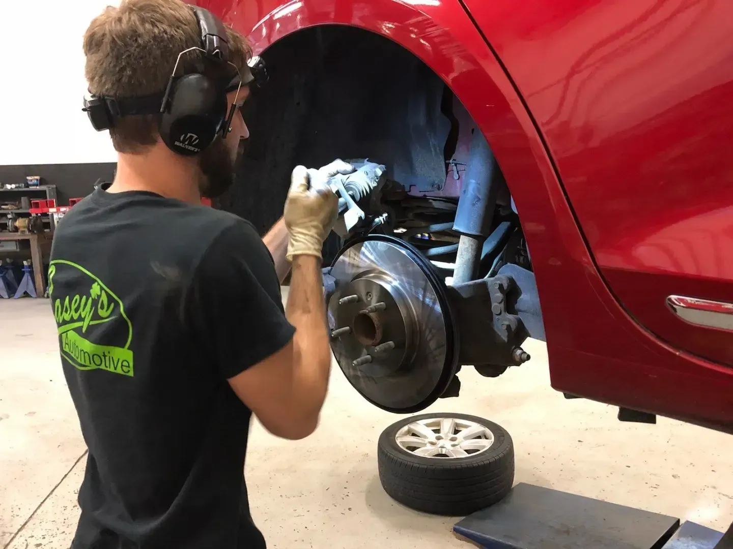 Technician performing brake repair | Casey's Automotive