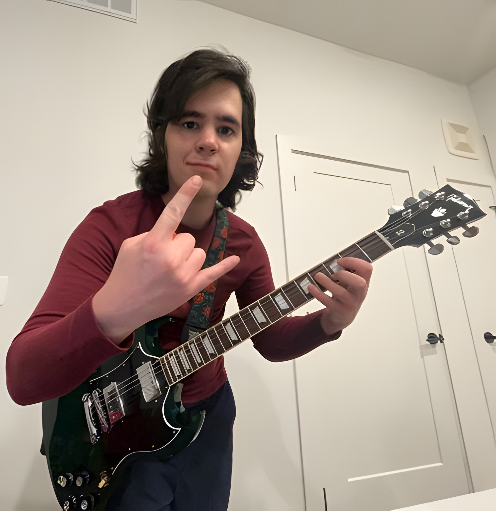 Man and guitar | Hill Country European Autoworks