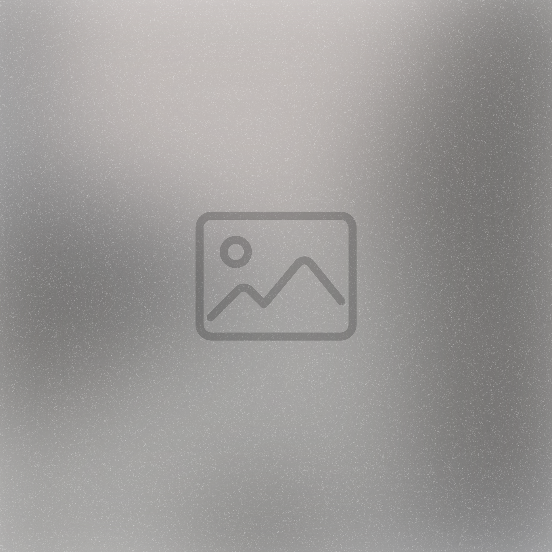 A picture of a mountain is displayed on a gray background.