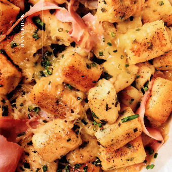 A close up of a plate of food that says ' woodstock ' on it