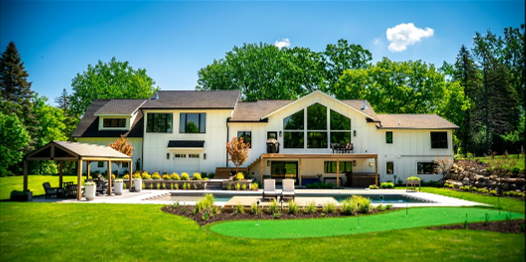 A beautiful home with a landscaped yard from a landscape design company. A beautiful home with a landscaped yard from a landscape design company.