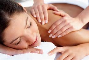 A woman is getting a massage at a spa.
