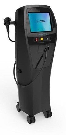 A black machine with wheels and a screen on a white background.