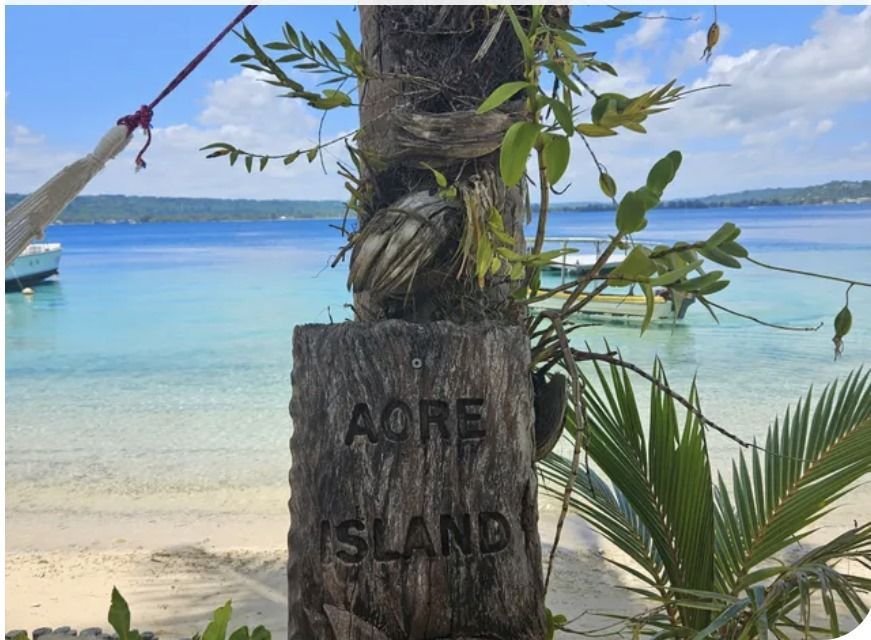 Aore Island sign on a stump Vanuatu