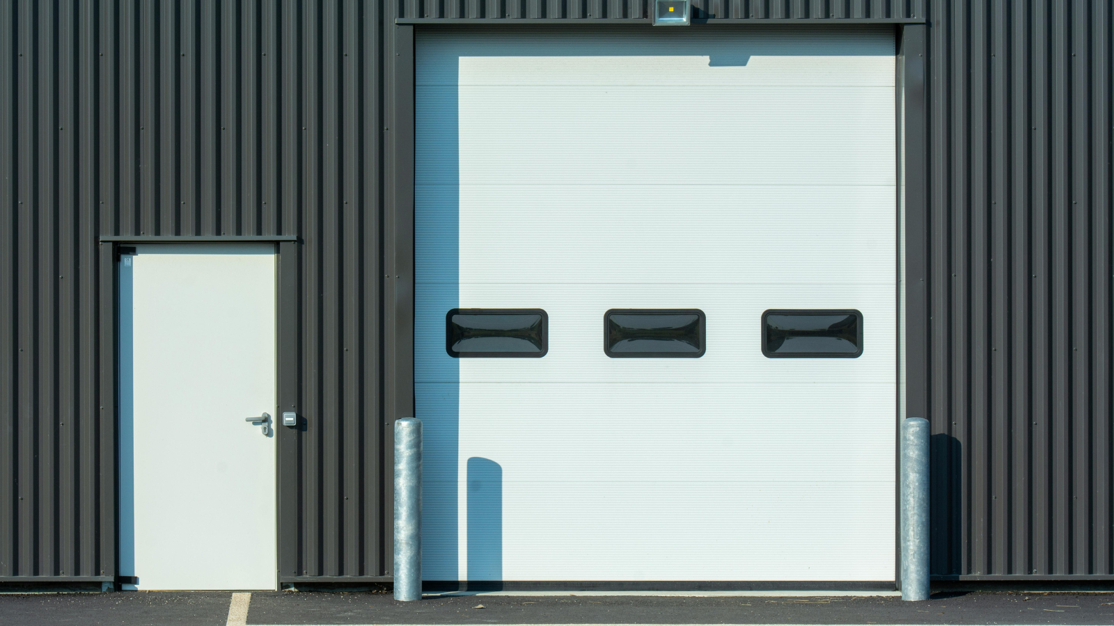 A white commercial steel garage door