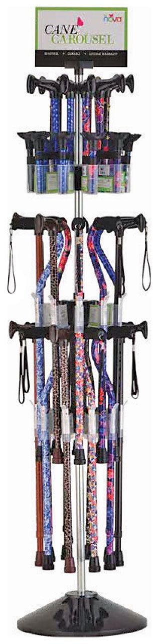 A retail floor display rack stocked with a variety of patterned and colored walking canes.