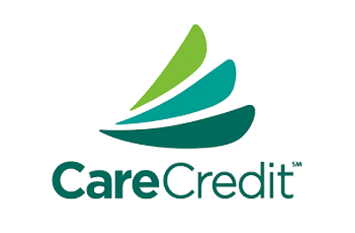 The CareCredit logo featuring three stylized, overlapping leaf-like shapes in shades of green above the text