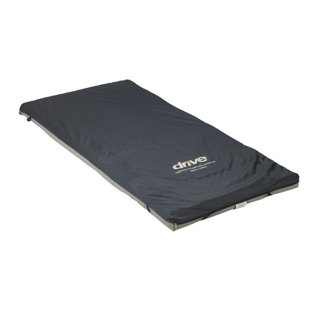 A Drive Medical foam mattress topper in dark blue with a branded cover, shown at an angle on a white background.
