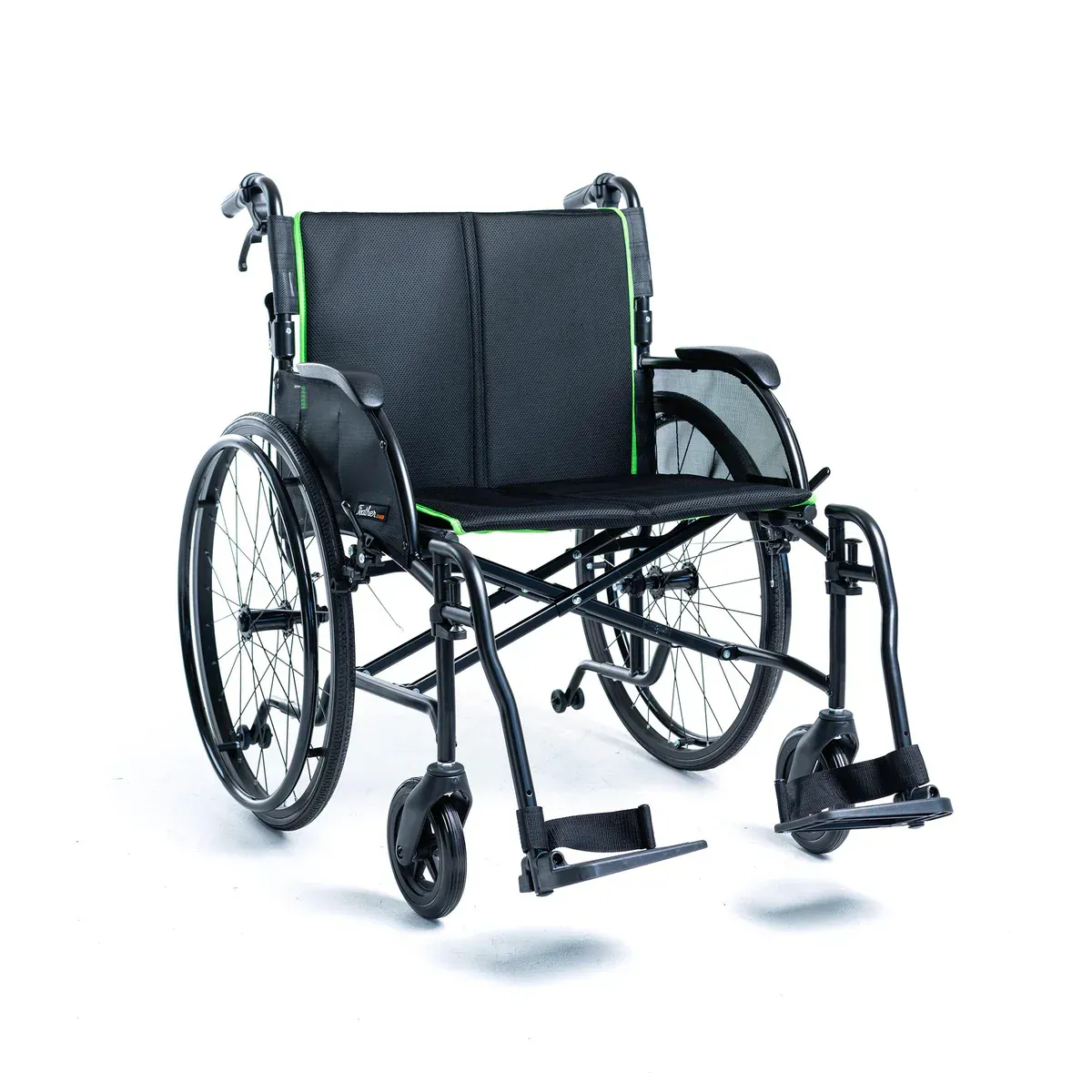 A black manual wheelchair with green trim and large rear wheels, set against a plain white background.