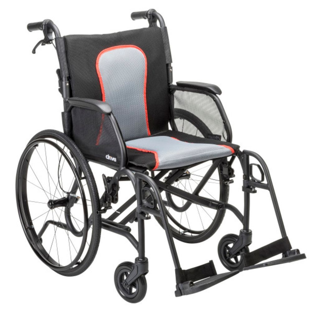 A black and grey manual wheelchair with a padded seat and backrest, against a white background.