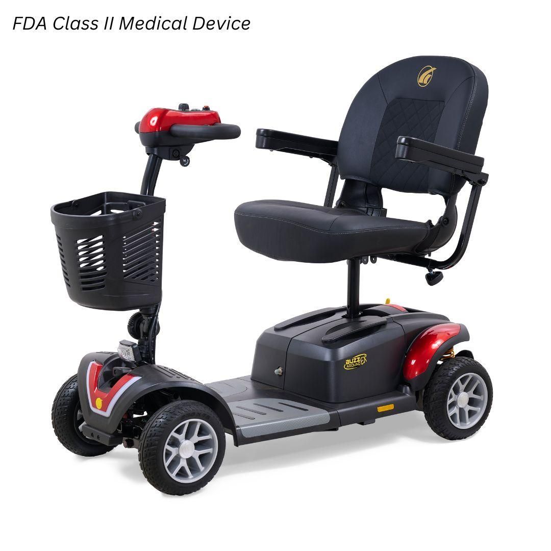 A red and black four-wheeled portable mobility scooter with a front basket and cushioned seat.