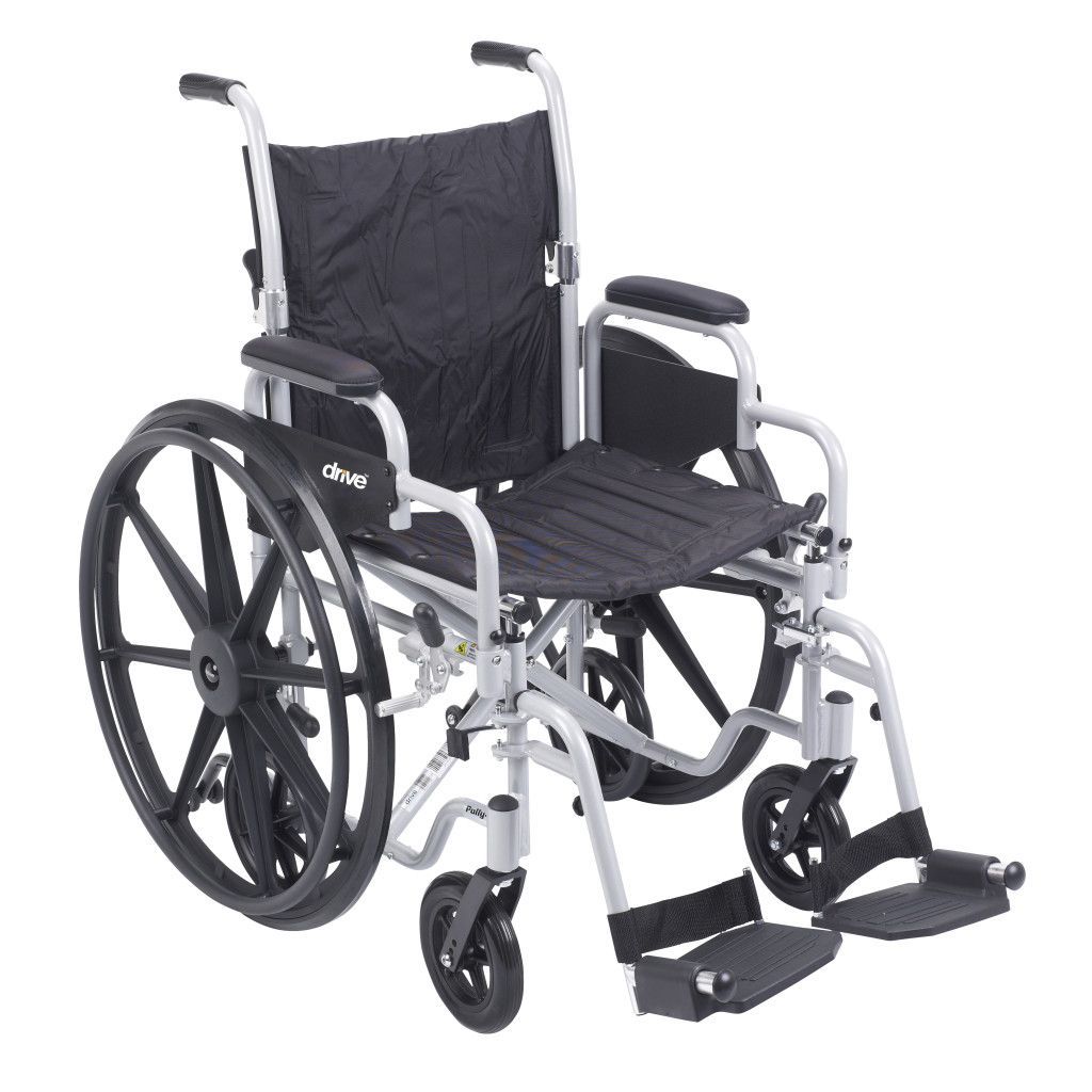 A Drive Medical manual wheelchair with a silver frame, black vinyl upholstery, and large, solid-tire wheels.