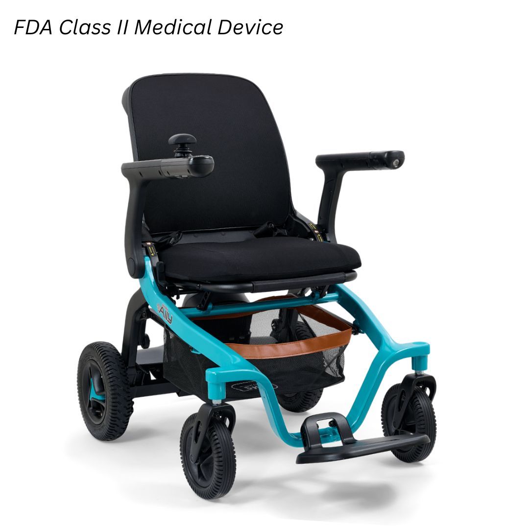A teal-colored power wheelchair with black seating, armrests, and a storage basket underneath, on a white background.