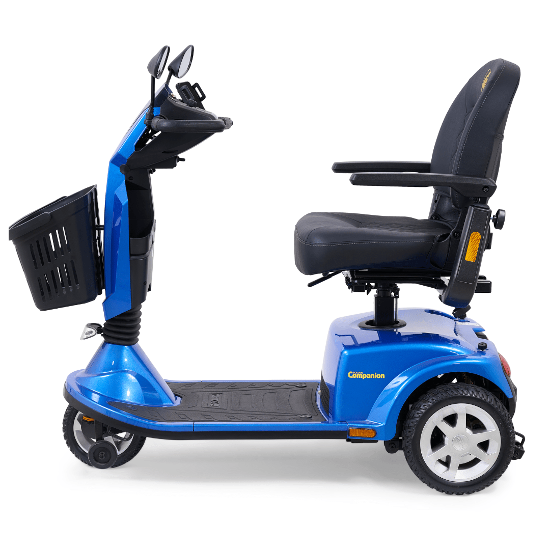 A blue three-wheeled mobility scooter with a black seat, armrests, and a front storage basket on a white background.