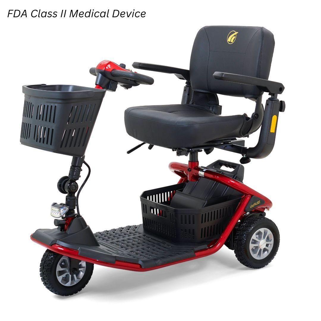 Red three-wheeled mobility scooter with a black seat, front basket, and storage area near the base.