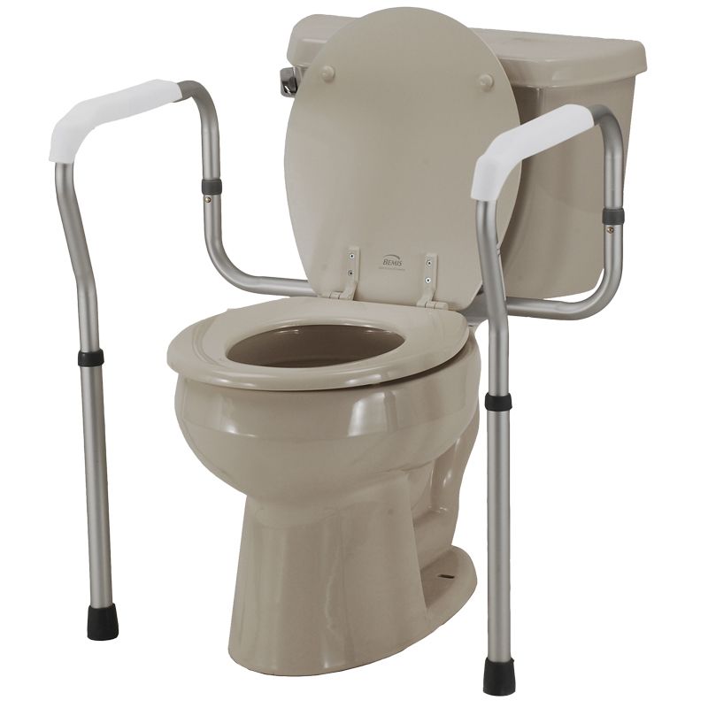 Beige bedside commode with raised toilet seat and metal armrests, shown on a white background