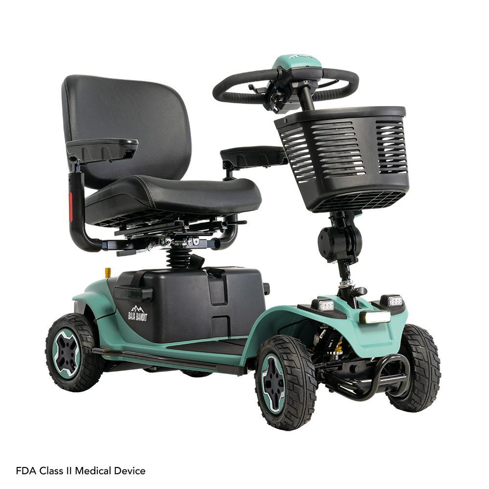 A teal, four-wheeled mobility scooter with a black padded seat, front basket, and steering tiller.