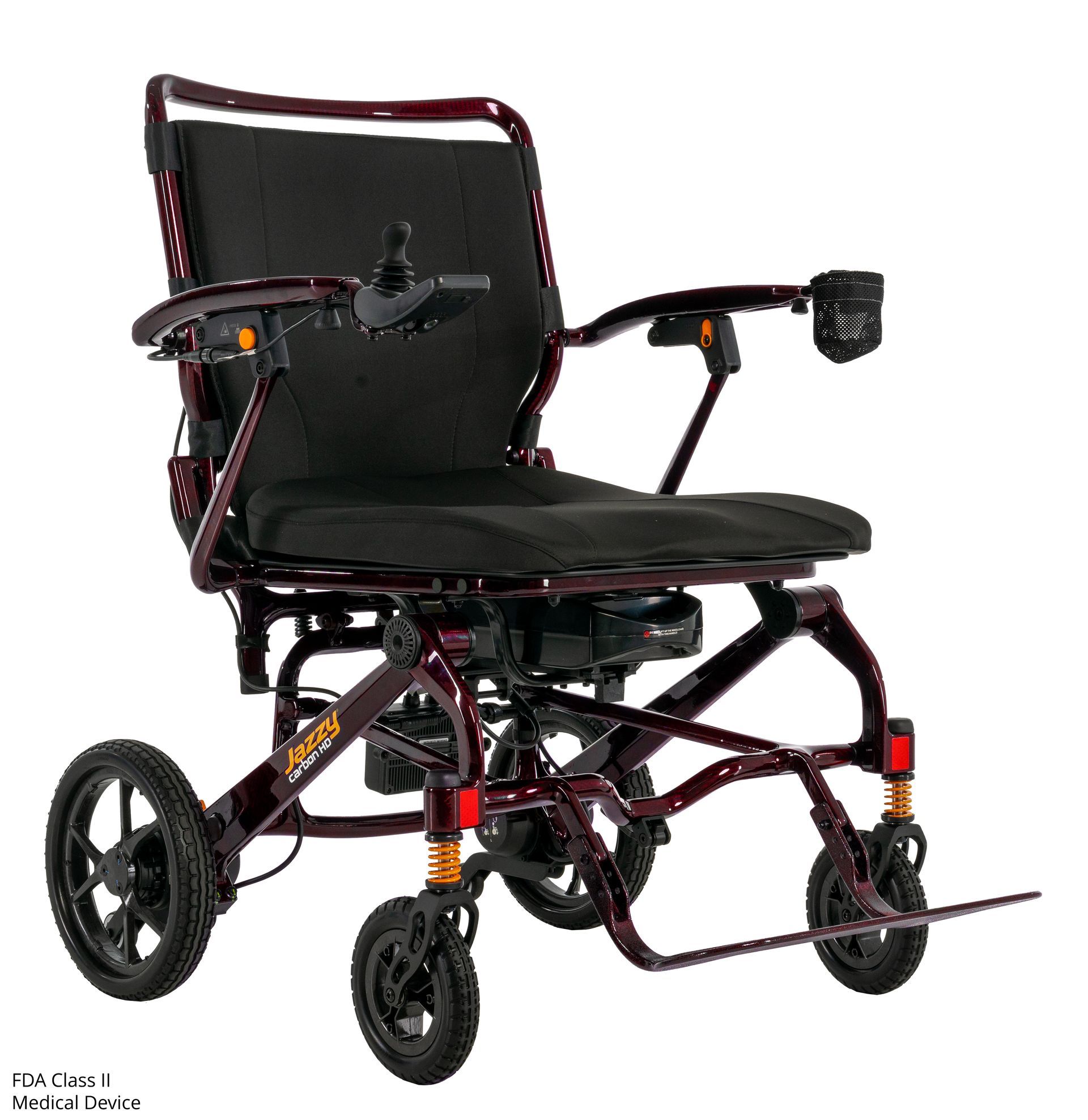 A maroon Jazzy Passport folding power wheelchair with a black seat and joystick controller on a white background.