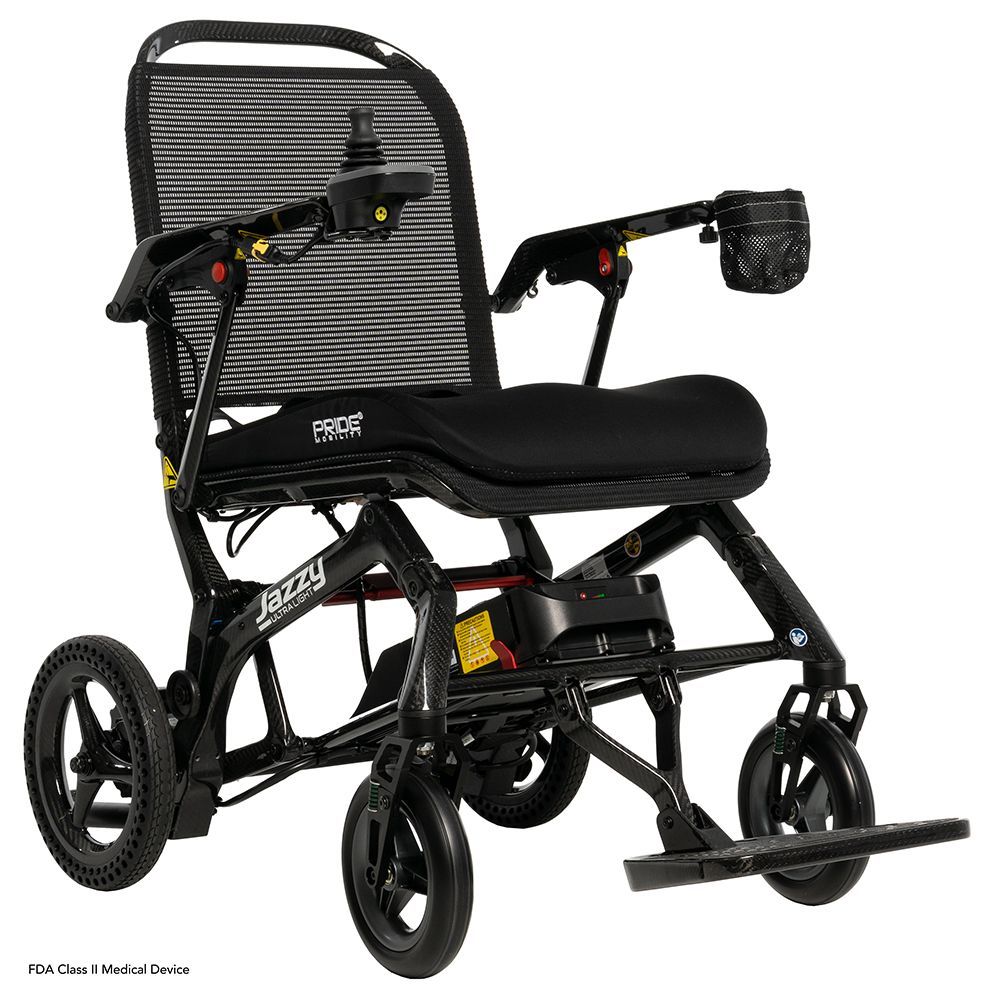 A black Jazzy Passport power wheelchair with a mesh backrest, seat cushion, and joystick controller.