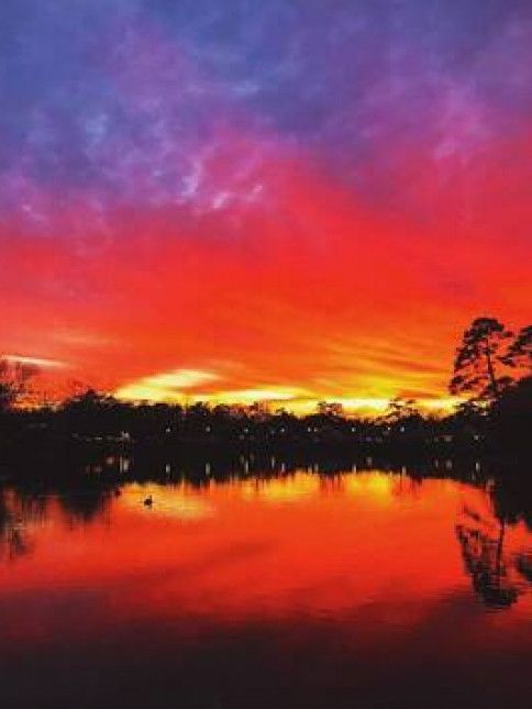 Sun setting over the Smithville Village by photographer Angela Campanale.