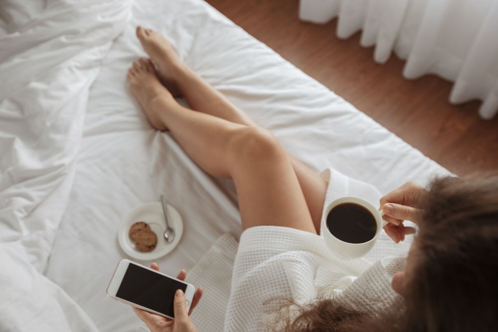 Man and a Woman Laying on a Bed — Daze & Nites Lingerie in Buderim, QLD