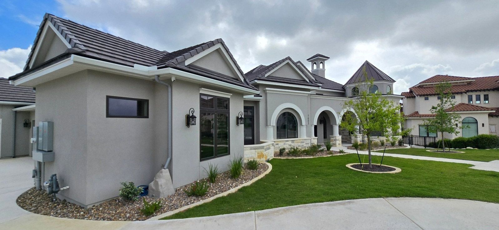 Modern suburban house with manicured lawn