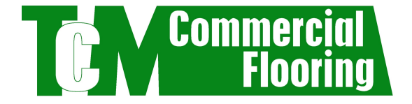 The logo for tcm commercial flooring is green and white