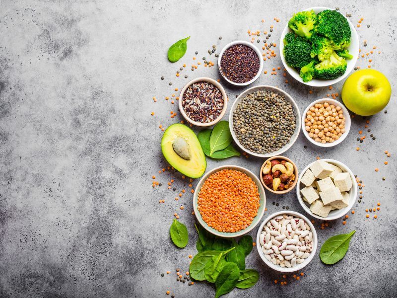 A variety of healthy foods in bowls on a table.