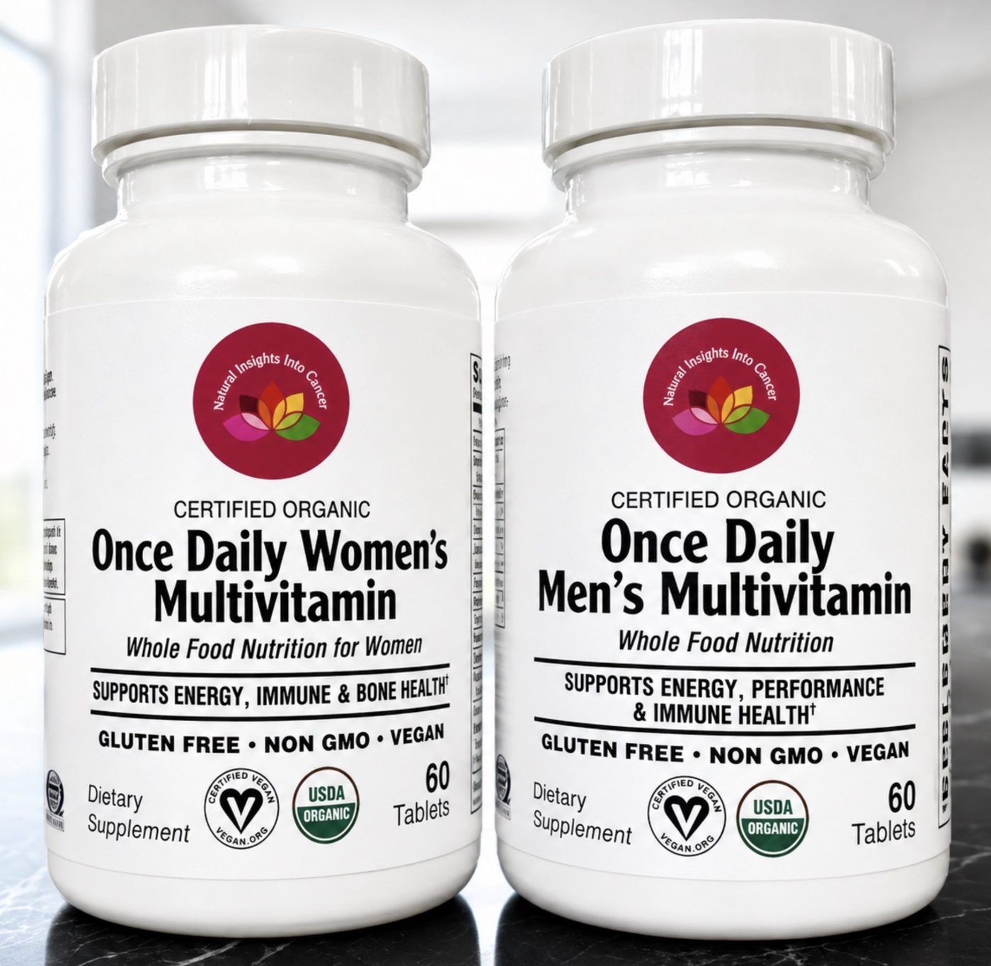 Natural Insights Into Cancer Once Daily Women's and Men's Multivitamin bottles, certified organic, 60 tablets each