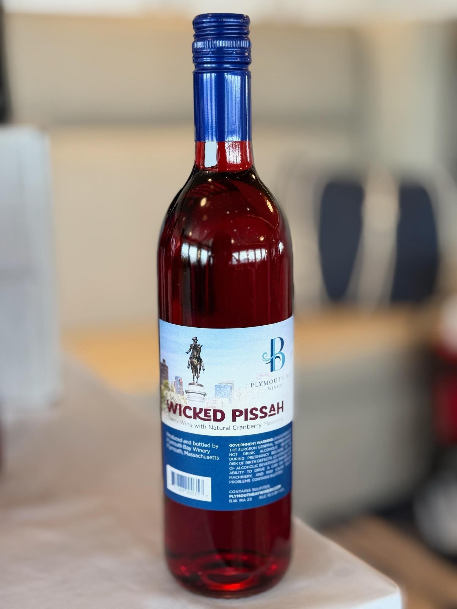 Bottle of red wine labeled 
