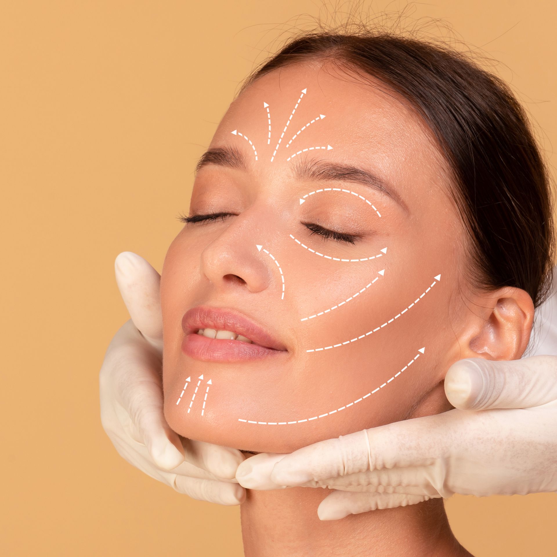 A woman is getting her face examined by a doctor.